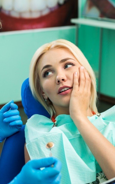 Woman at dental office for emergency dental treatment in Burien