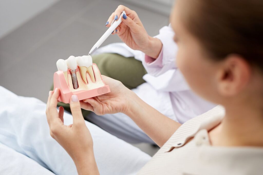 A woman at a dental implant consultation
